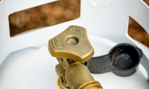 The top of a propane tank